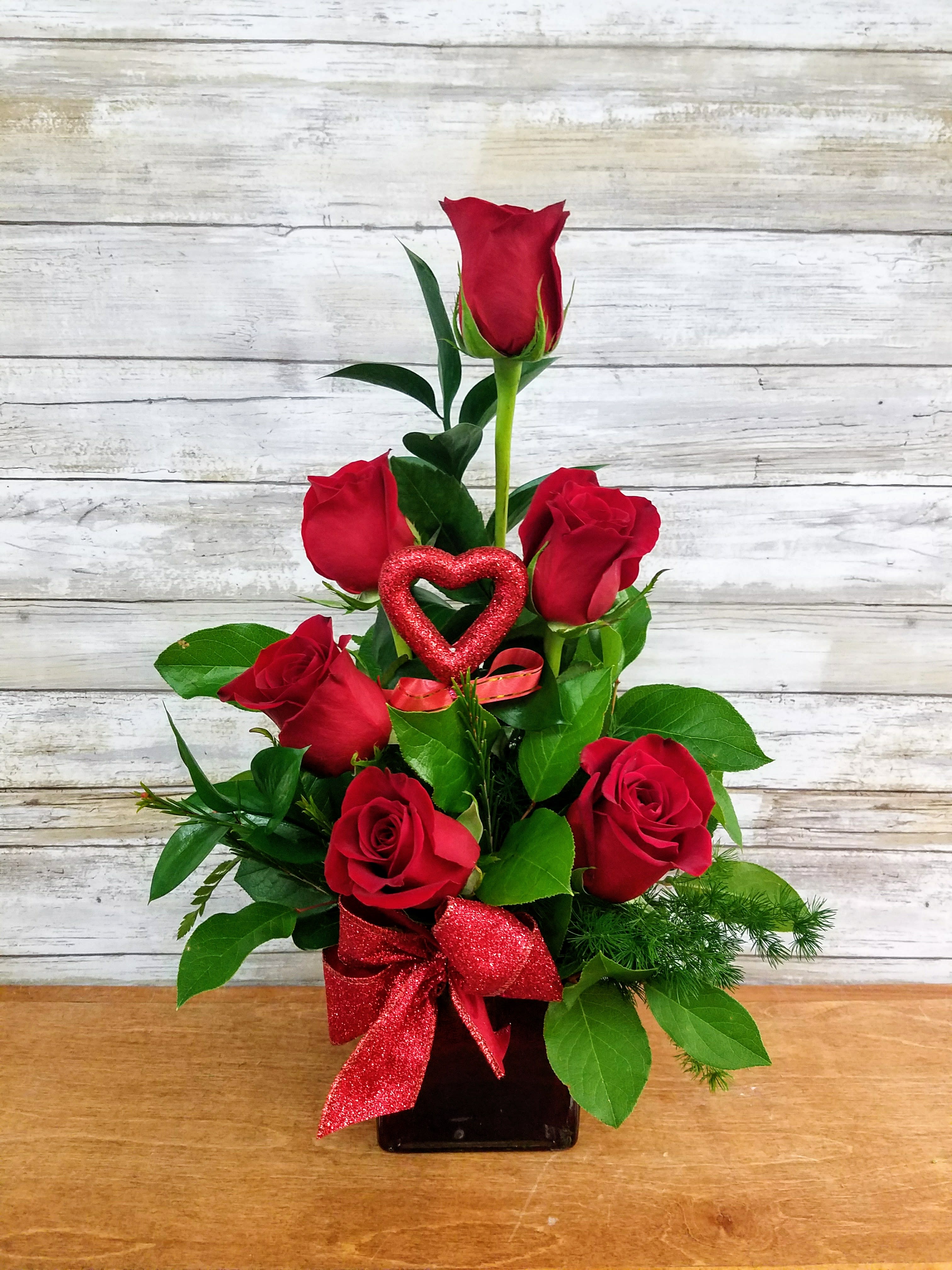 half dozen red roses