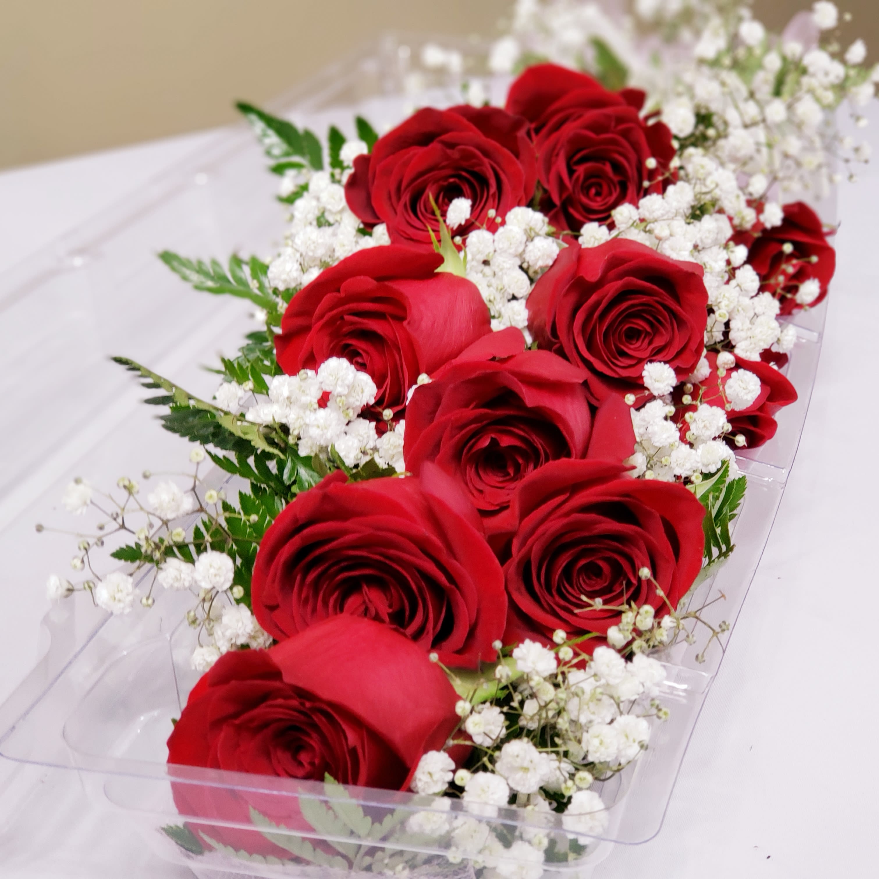 red roses wrapped bouquet