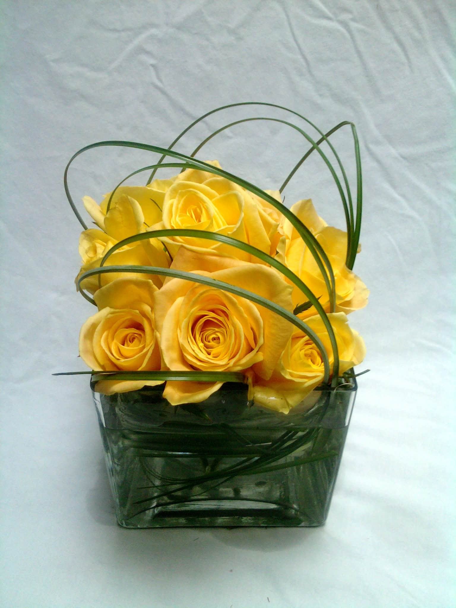 Yellow Roses In Short Vase By Showcase Flowers