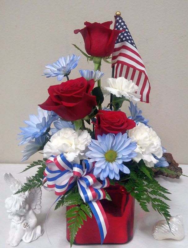 Red White And Blue Flag Stands Tall In Slidell La Weathers Flower Market