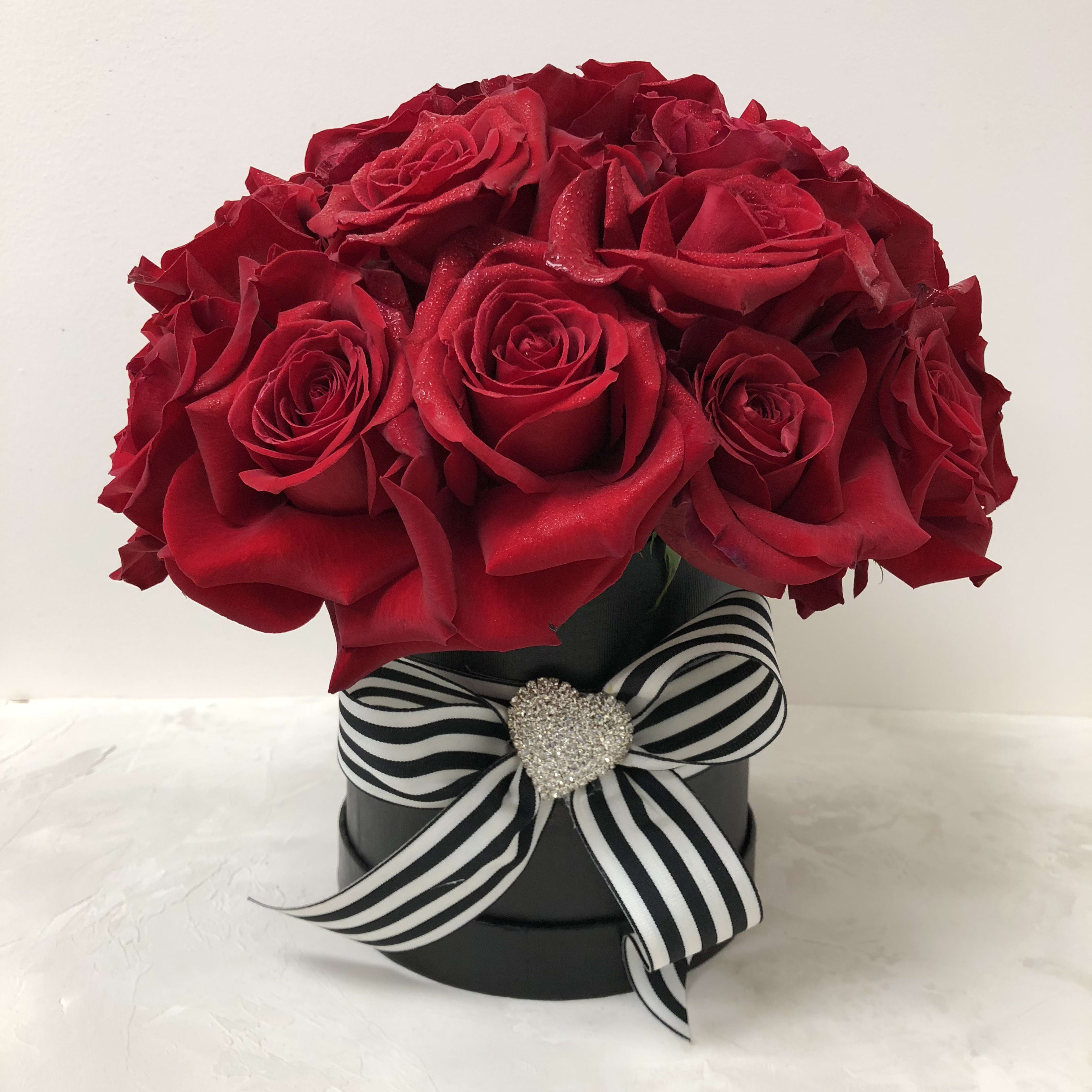 Roses in Hat Box by Celebrate Flowers and Invitations