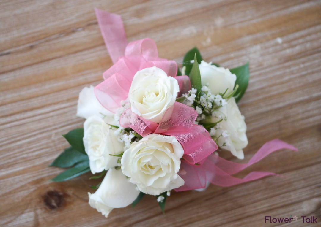 Prom Wrist Corsage Pink Ribbon White Flowers In Duluth Ga Flower Talk