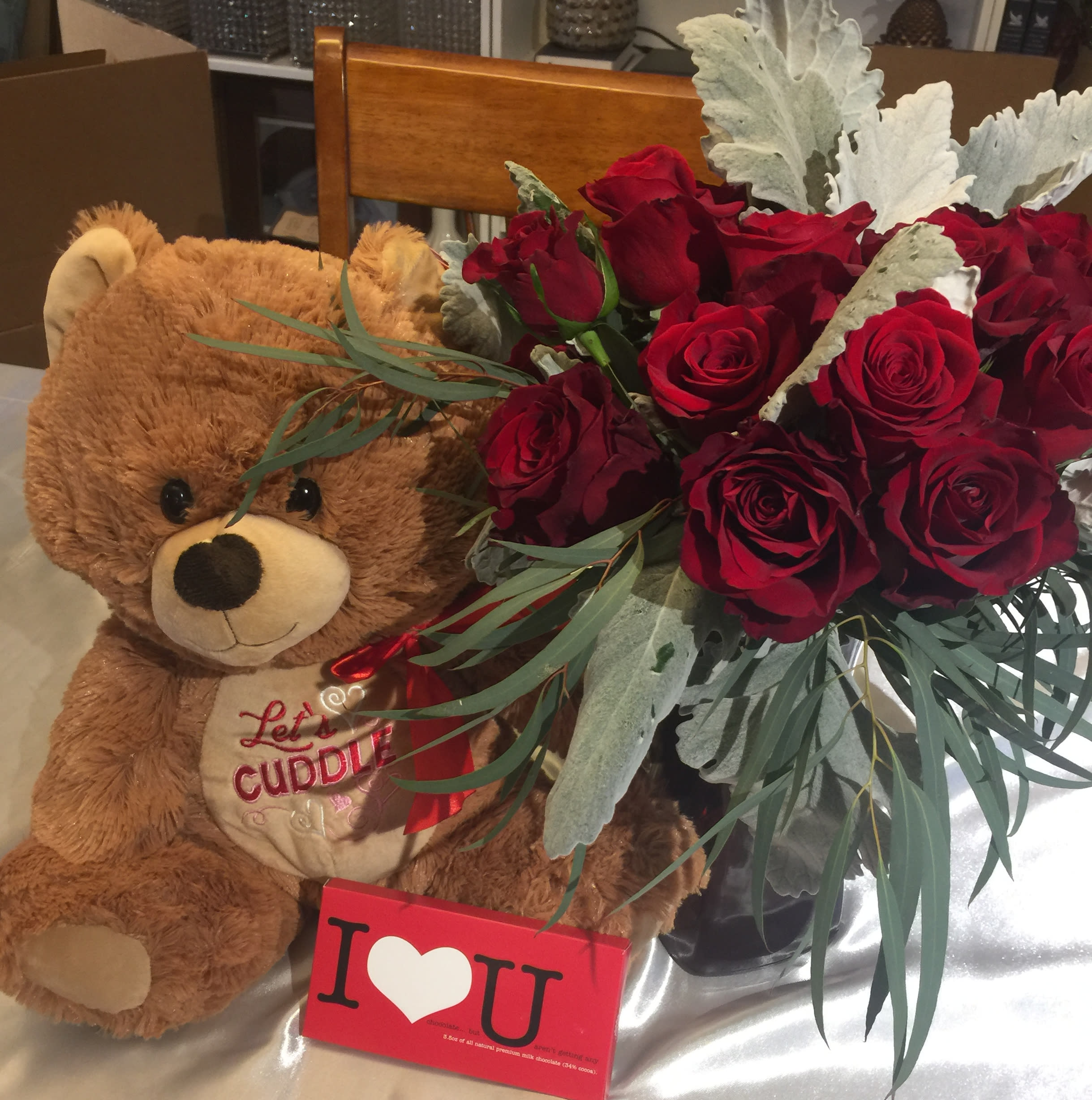 teddy bear with roses and chocolates