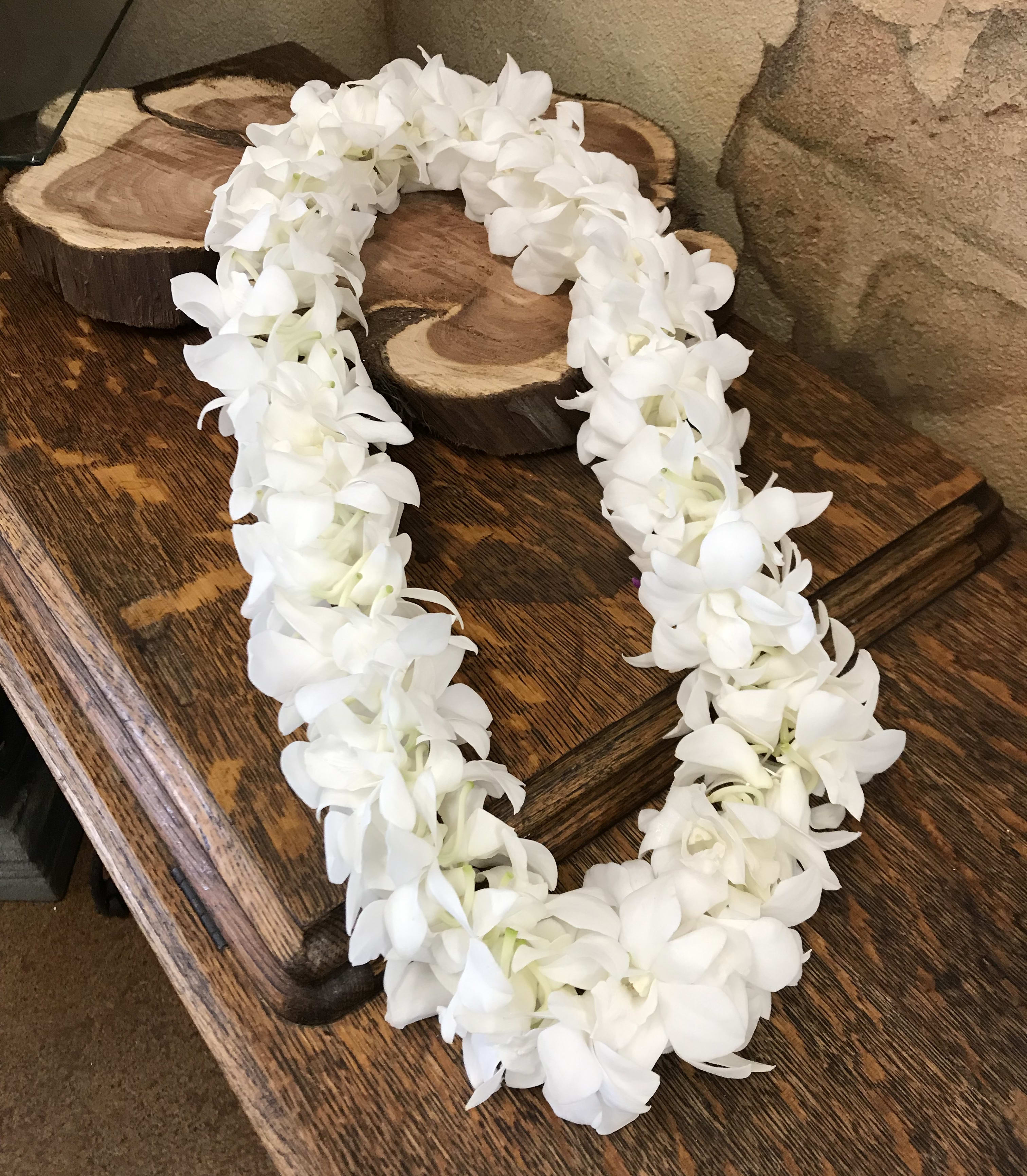 Double White Orchid Lei in Saugus, CA Charmaine's Bouquet Canyon Florist