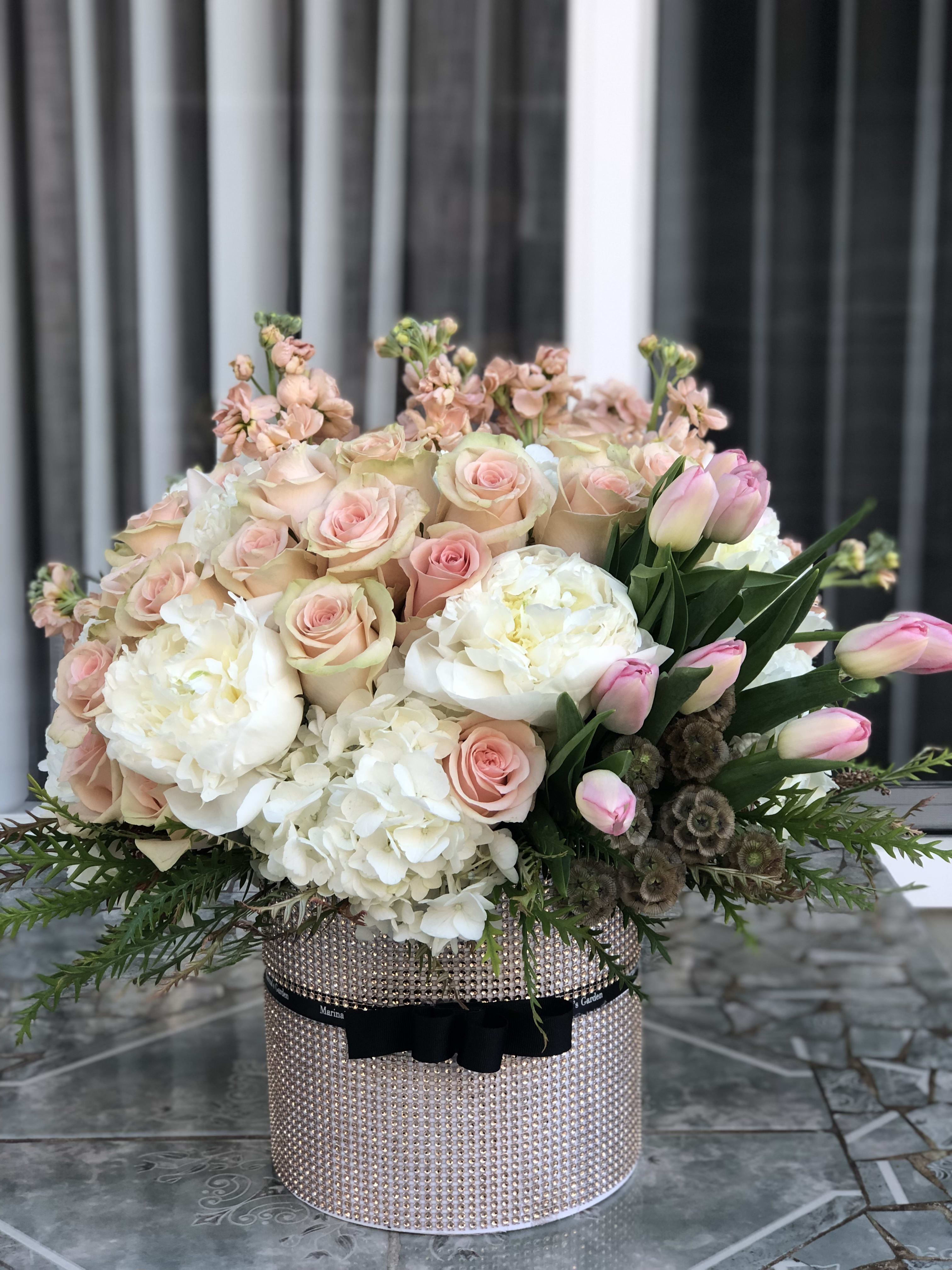 Beautiful Flowers Arranged In A Hat Box In Los Angeles Ca Marina S Garden