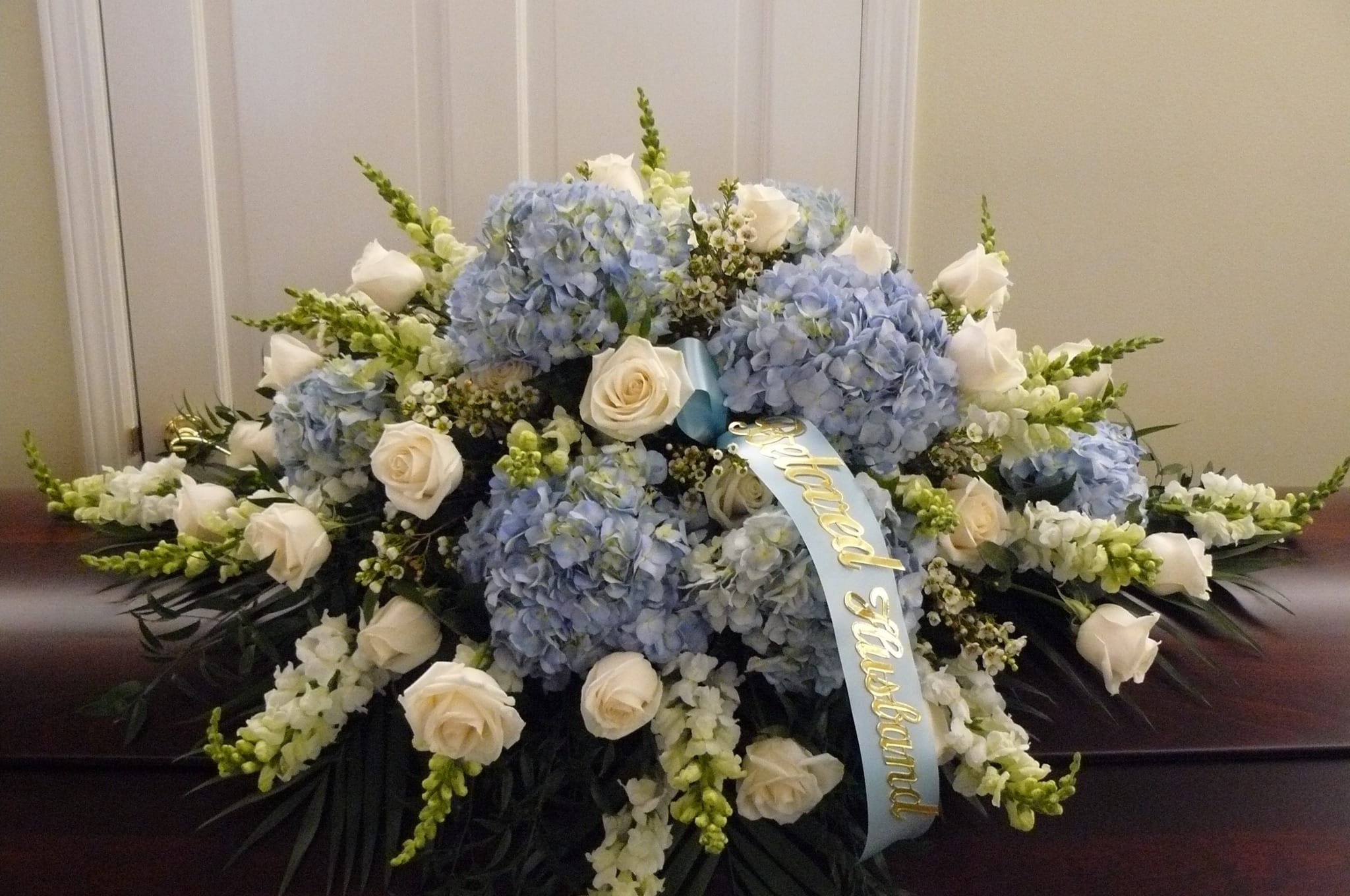 Casket Spray Flowers Blue Pale Blue & White Casket Spray in Elk City