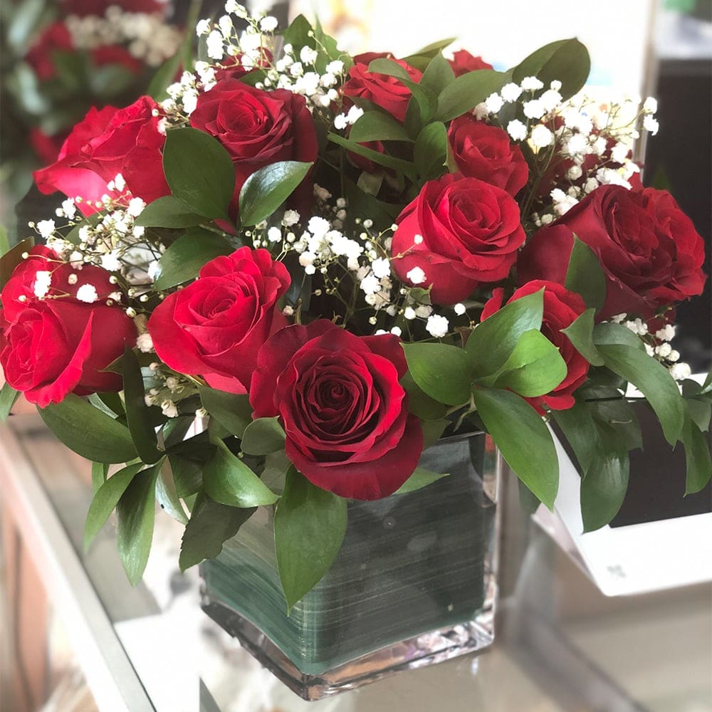 Red Roses In Square Vase