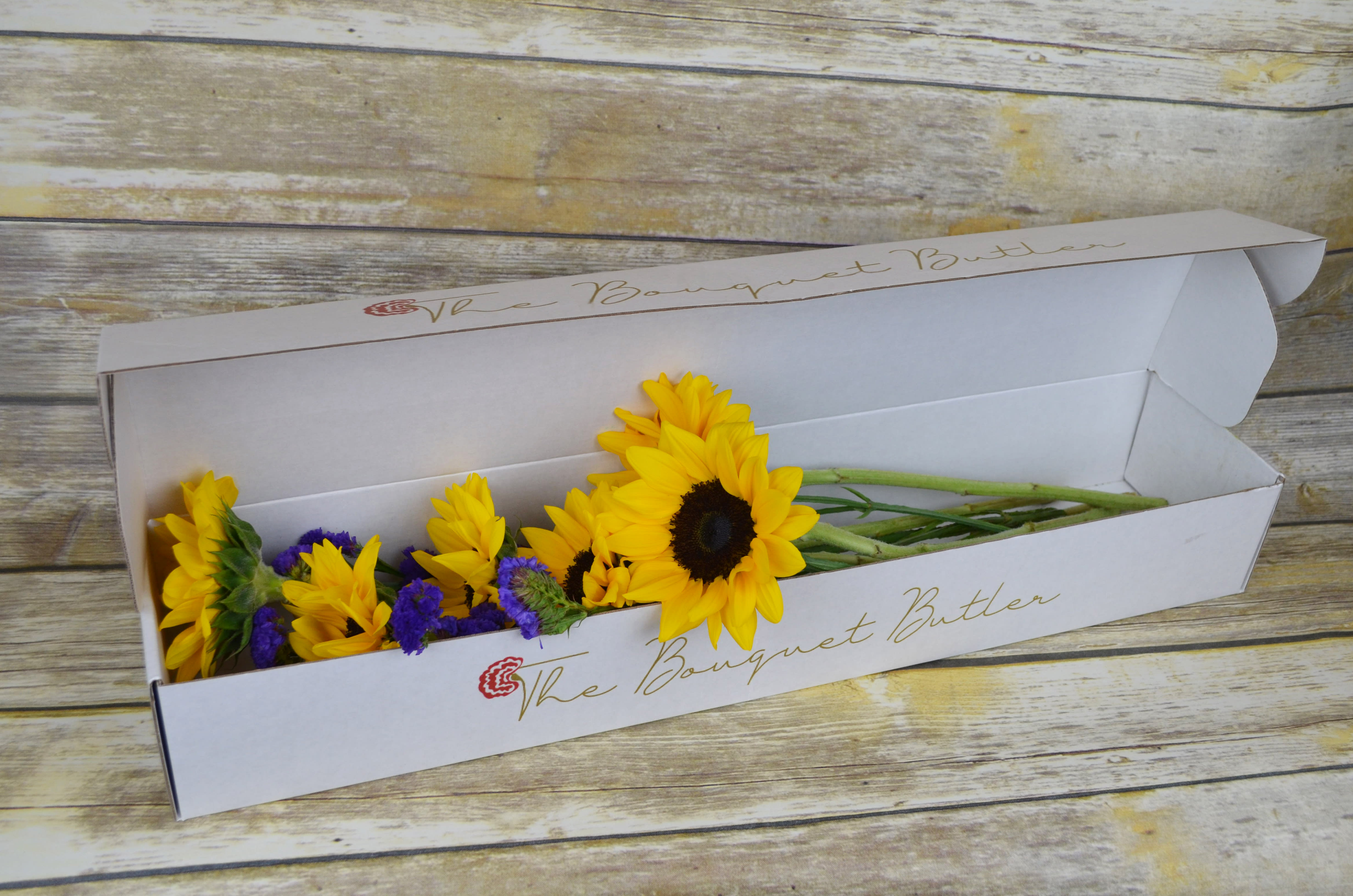 Summer Sun Boxed In Kissimmee Fl The Bouquet Butler