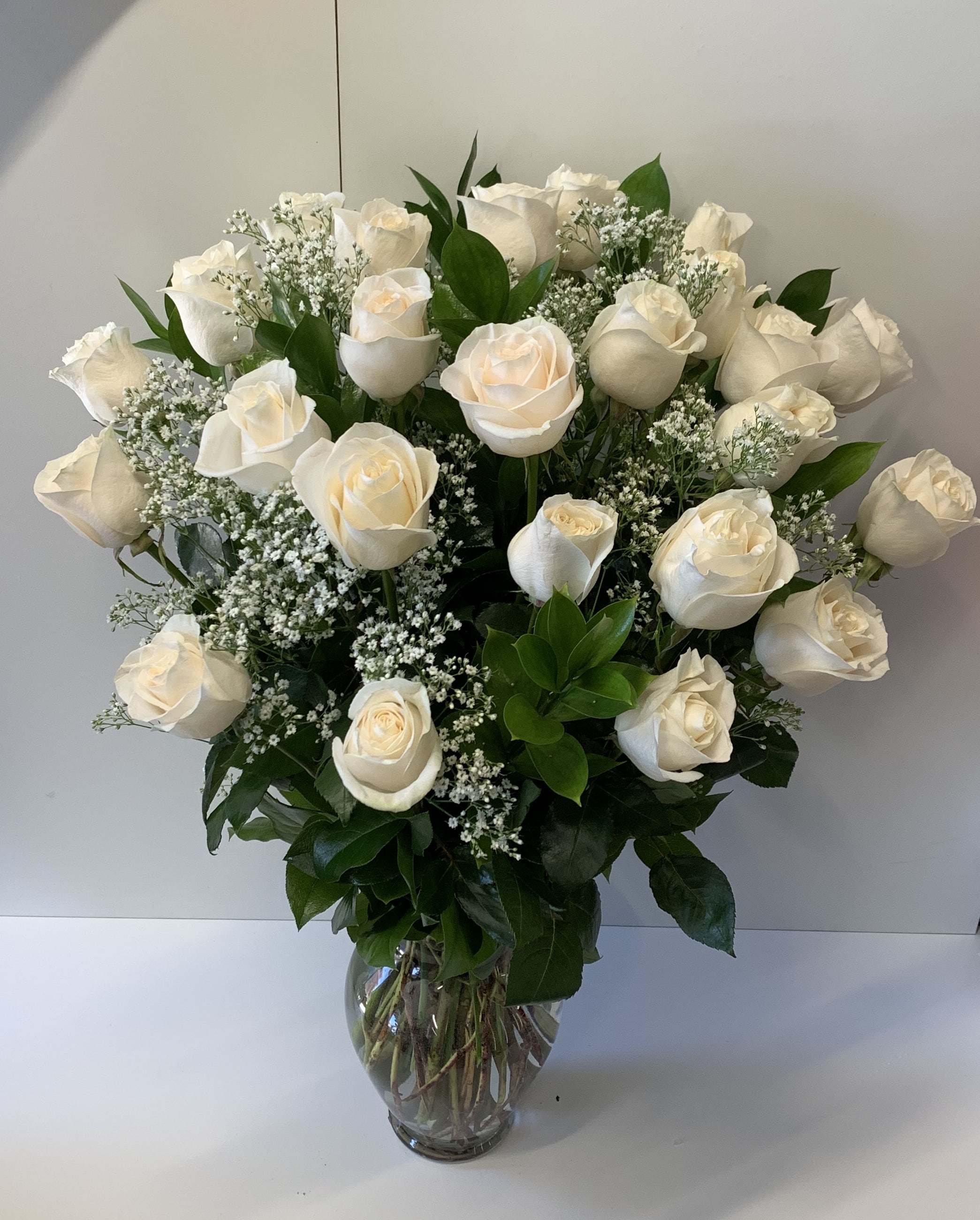 2 dozen white roses in Middle Village, NY Lovely Blooms Decorations Corp.