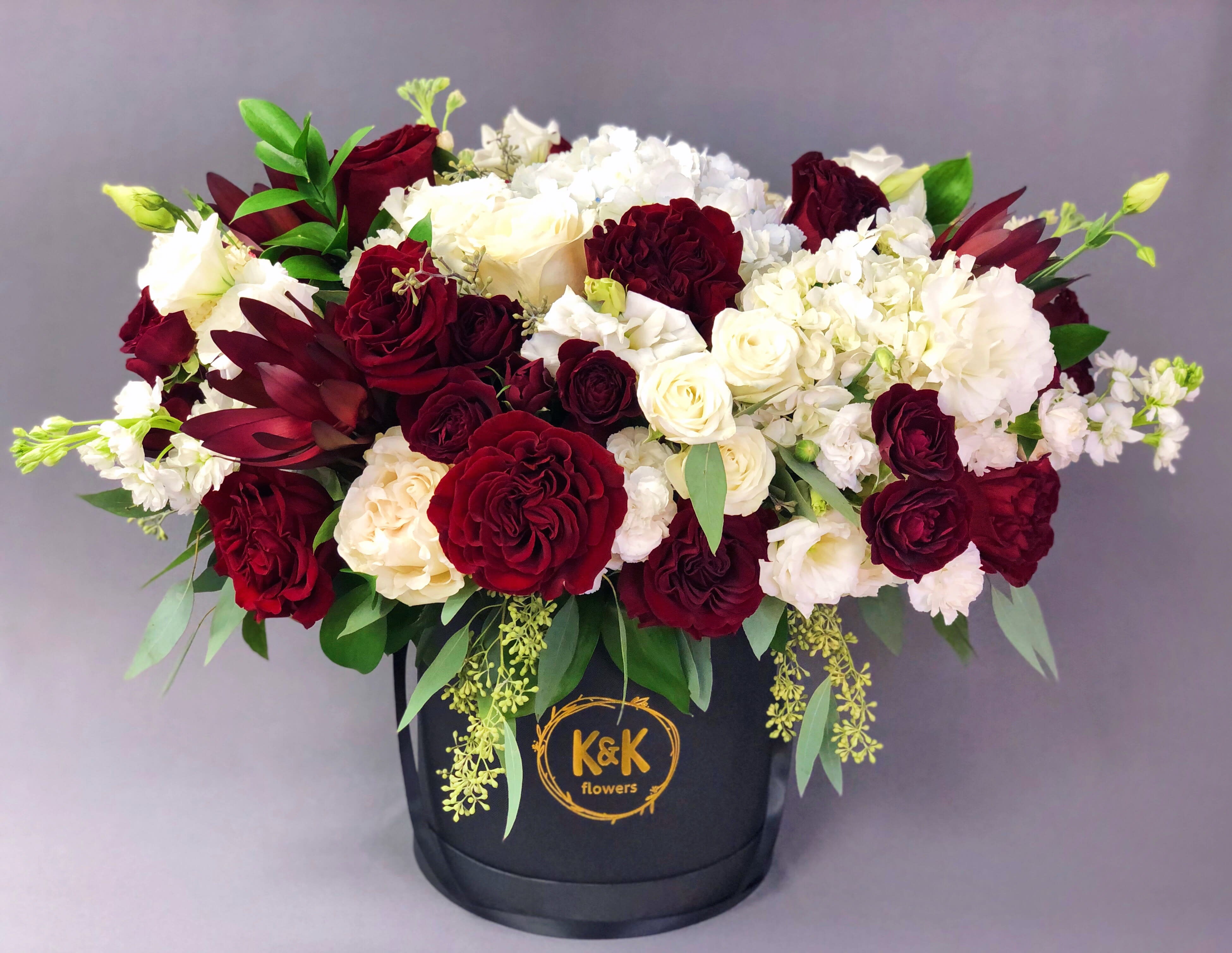 Download #48 - XXL hat box arrangement red and white in a black box in Hallandale Beach, FL | K&K Flowers