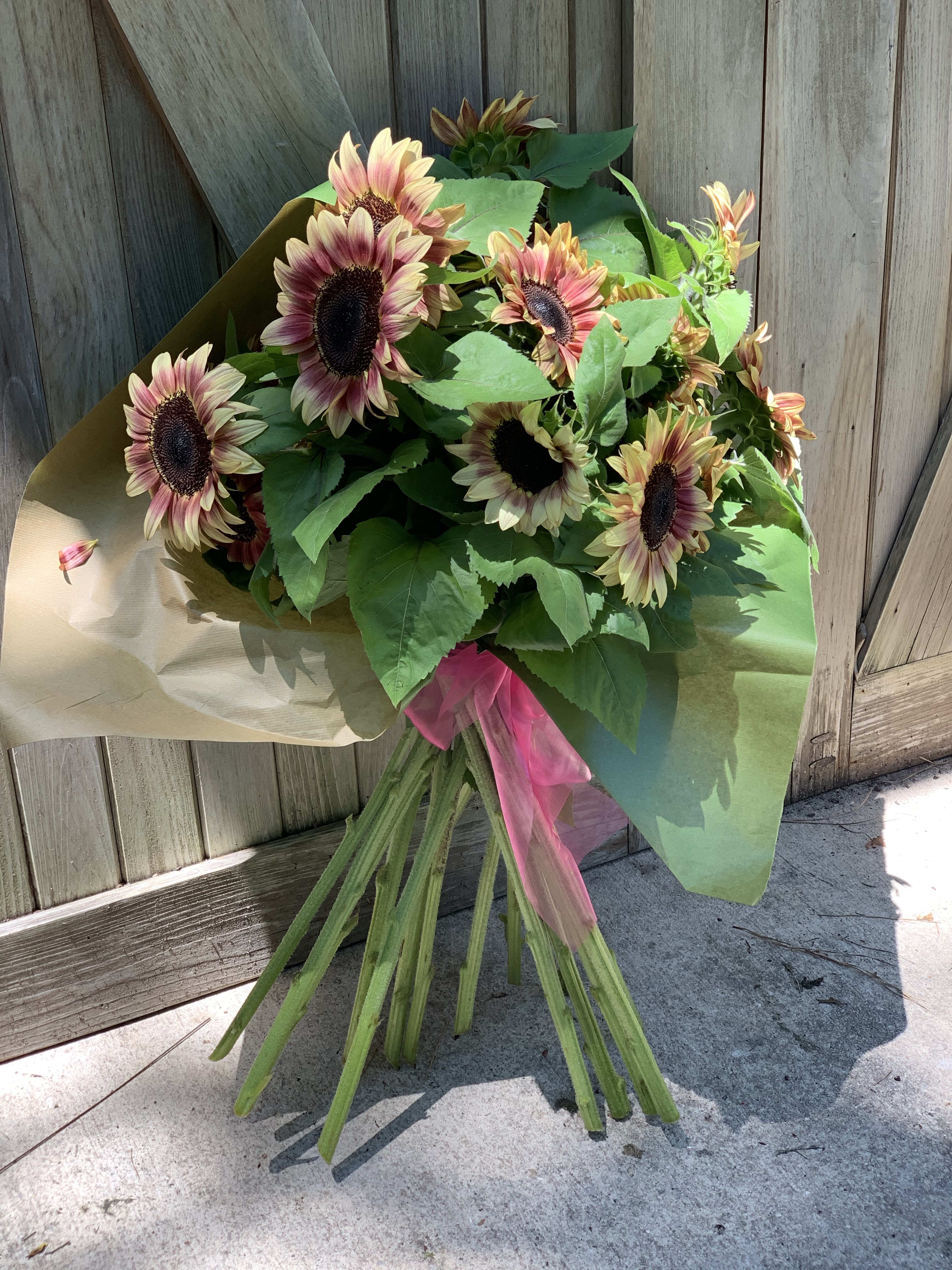 HUGE bouquet of sunflowers varying types as shown in Kitty Hawk, NC