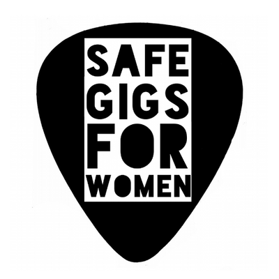 The logo of Safe Gigs for Women, a black lozenge shape representing a guitar pick. The organisation name, 'Safe Gigs for Women'. appears in a white rectangle, centred on the guitar pick shape.