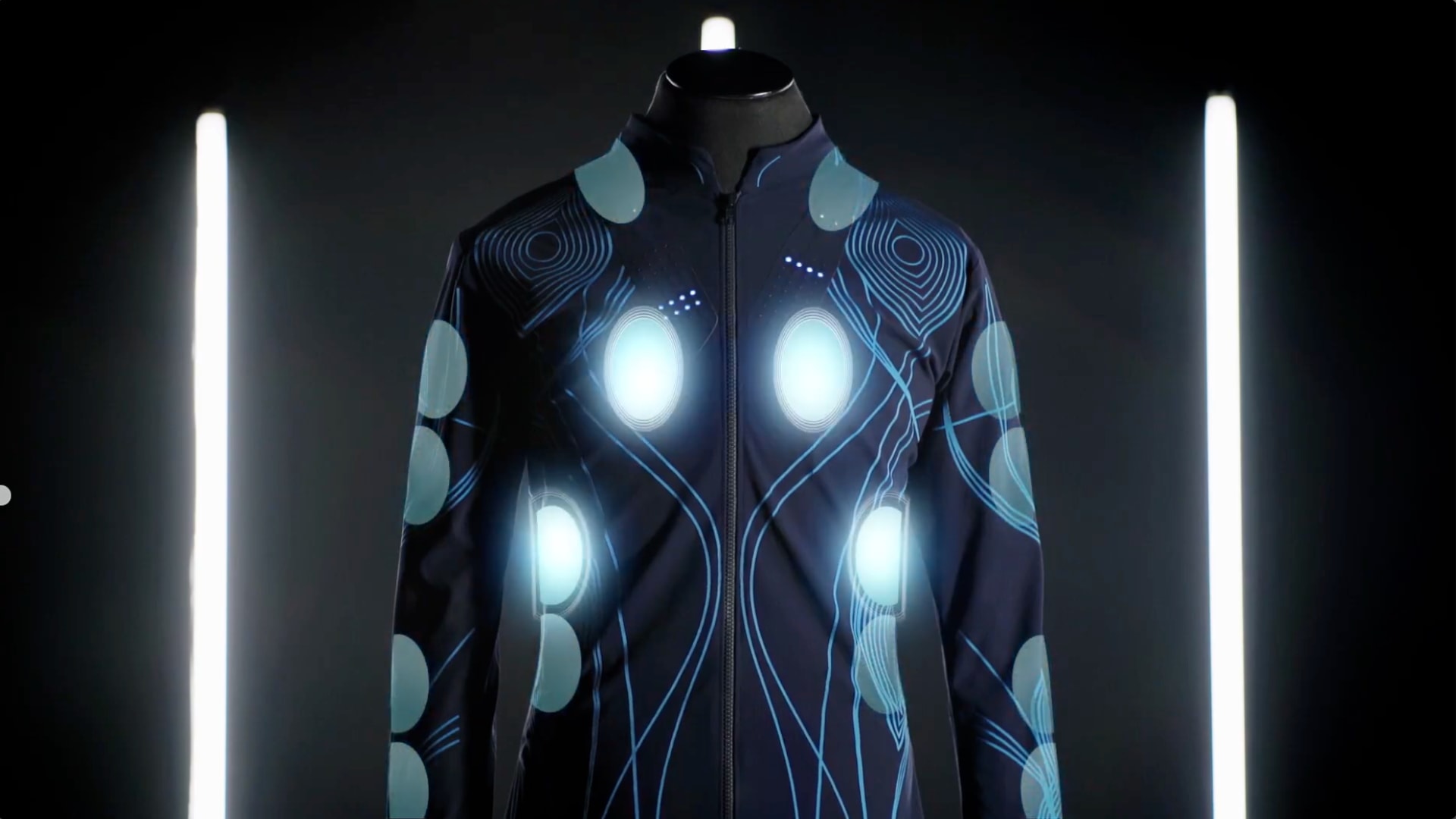 Futuristic illuminated jacket with glowing panels on display mannequin