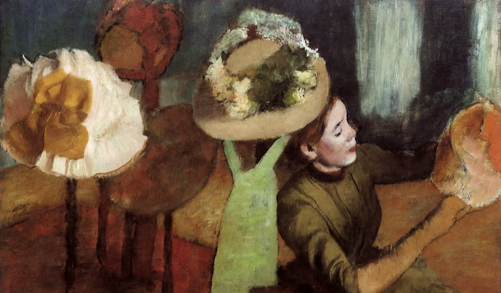 A painting depicts a woman seated in a shop examining a hat