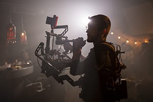 Cameraman at work on movie set