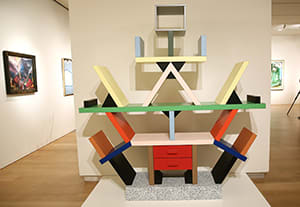 An Ettore Sottsass 'Carlton' bookcase, 1981, is on display