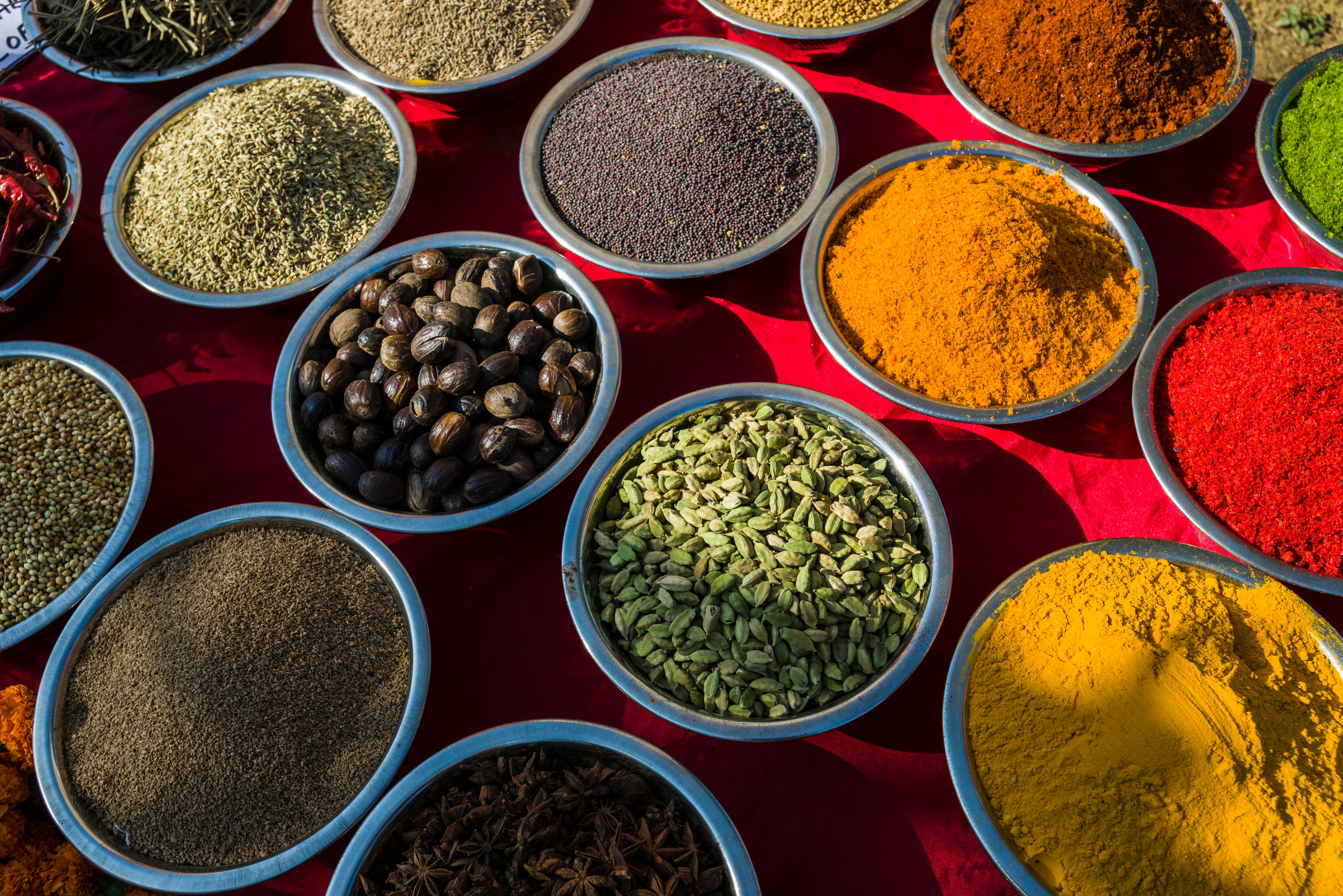 ANJUNA, GOA, INDIA - 2013/12/18: Many different goods like typical Indian spices and curries are presented in bags for sale at the weekly flea-market. (Photo by Frank Bienewald/LightRocket via Getty Images)