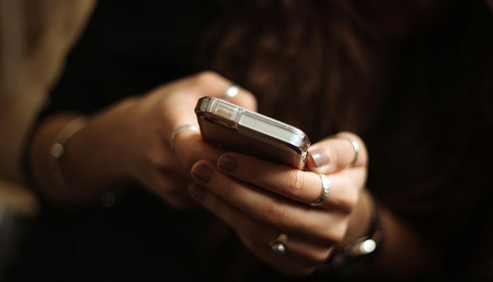 Person holding a phone