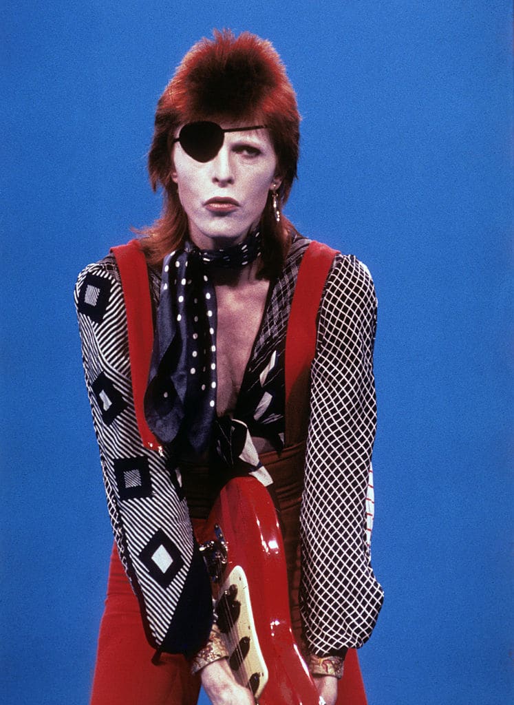 Photo of David Bowie wearing an eye patch, 1974