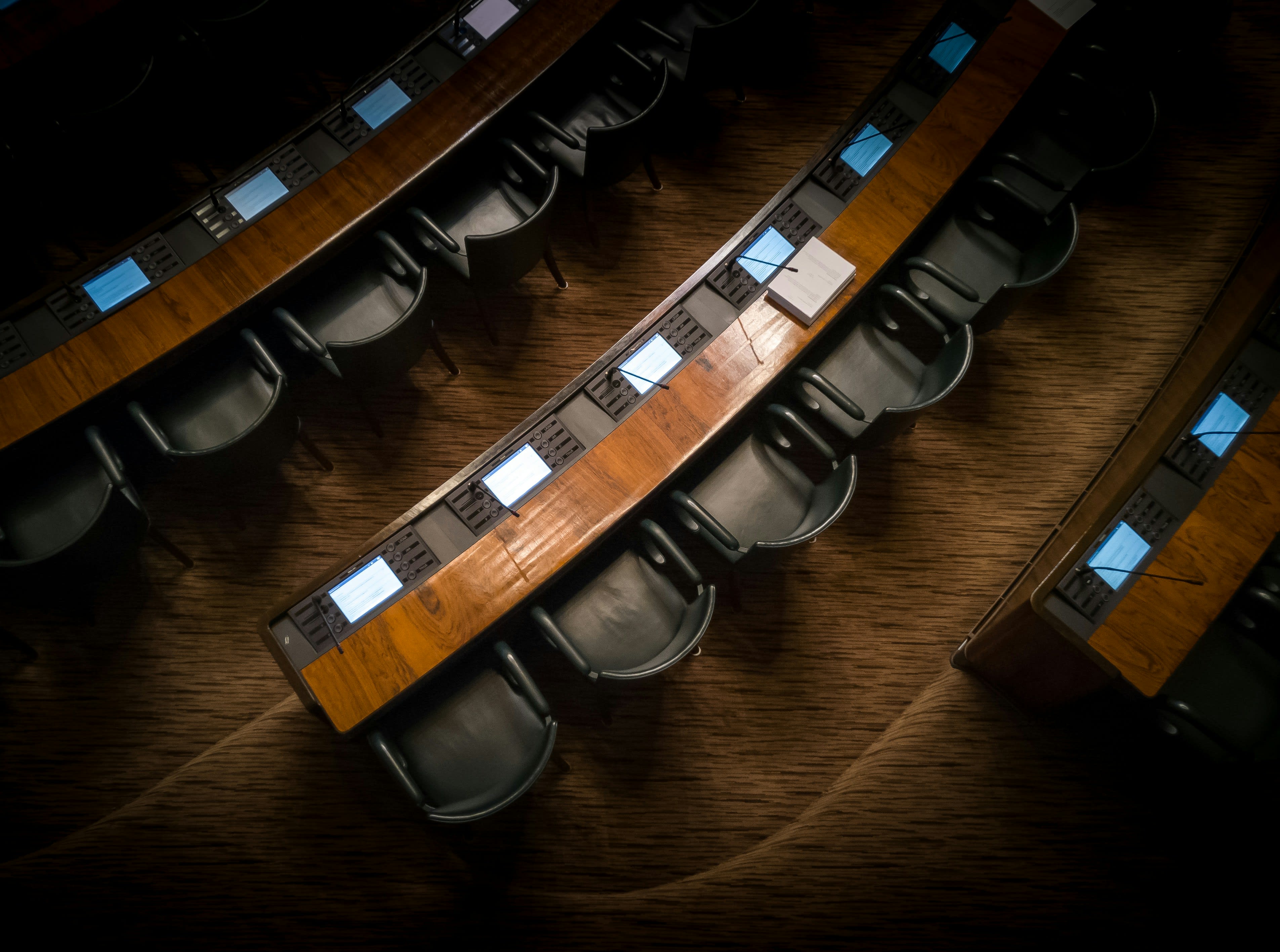 Bird's eye view of an empty parliament chamber