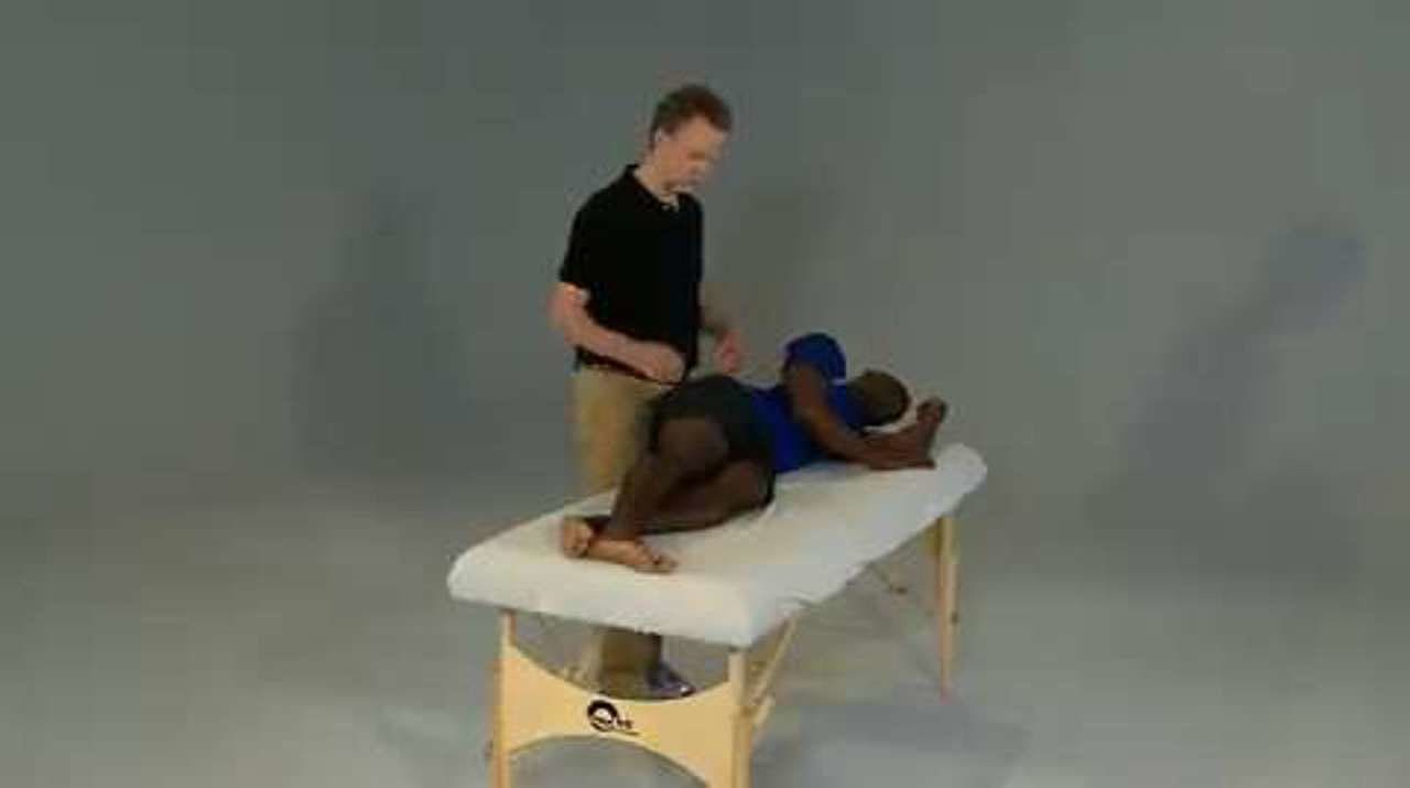 Hip Abductors Partner Stretch, Side-Lying on a Table