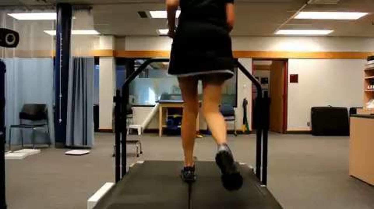 Excessive knee abduction (genu valgum) during running, posterior view