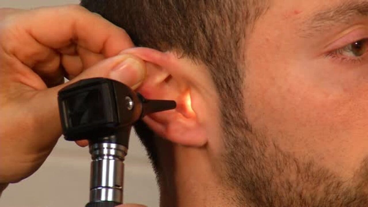 Using an otoscope