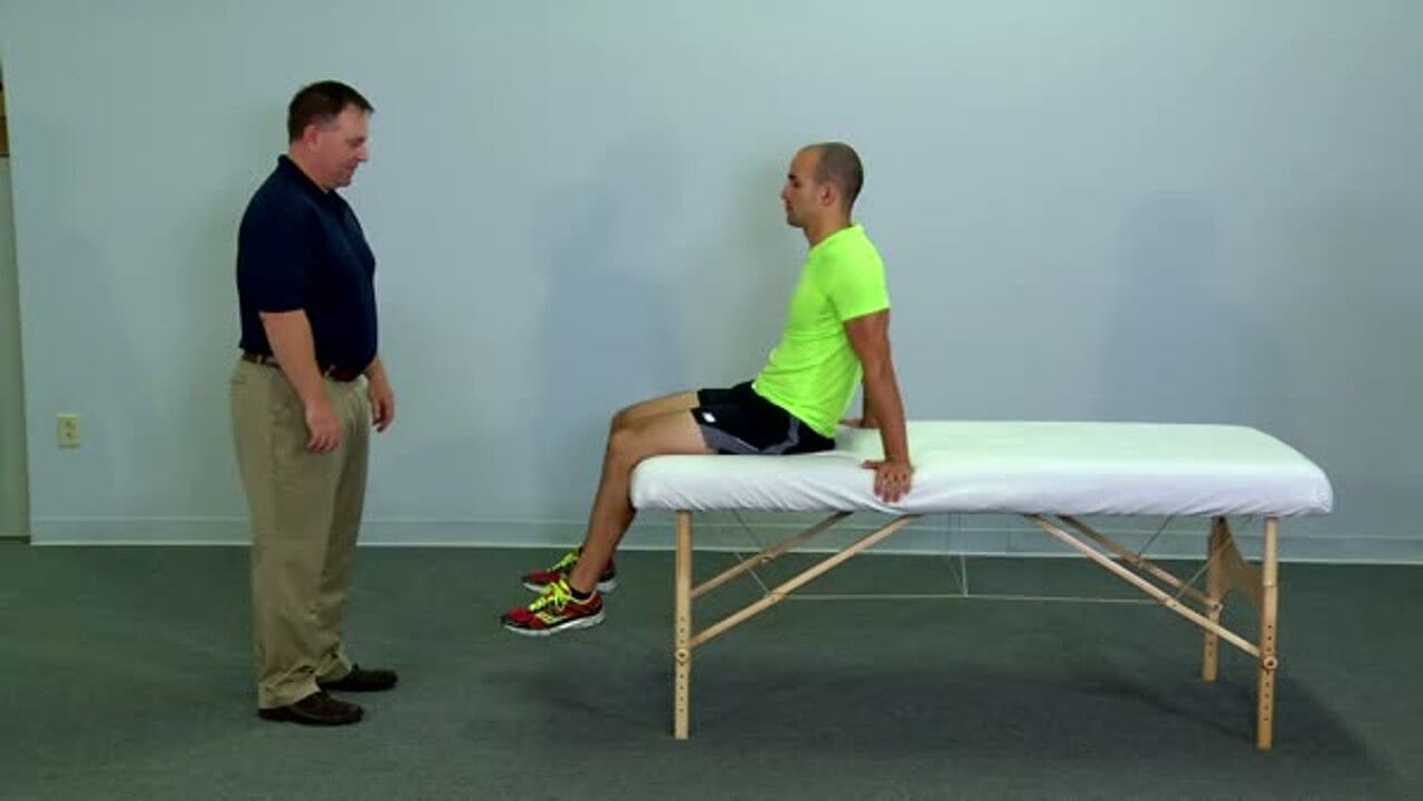 Proper body mechanics for a clinician while providing manual resistance