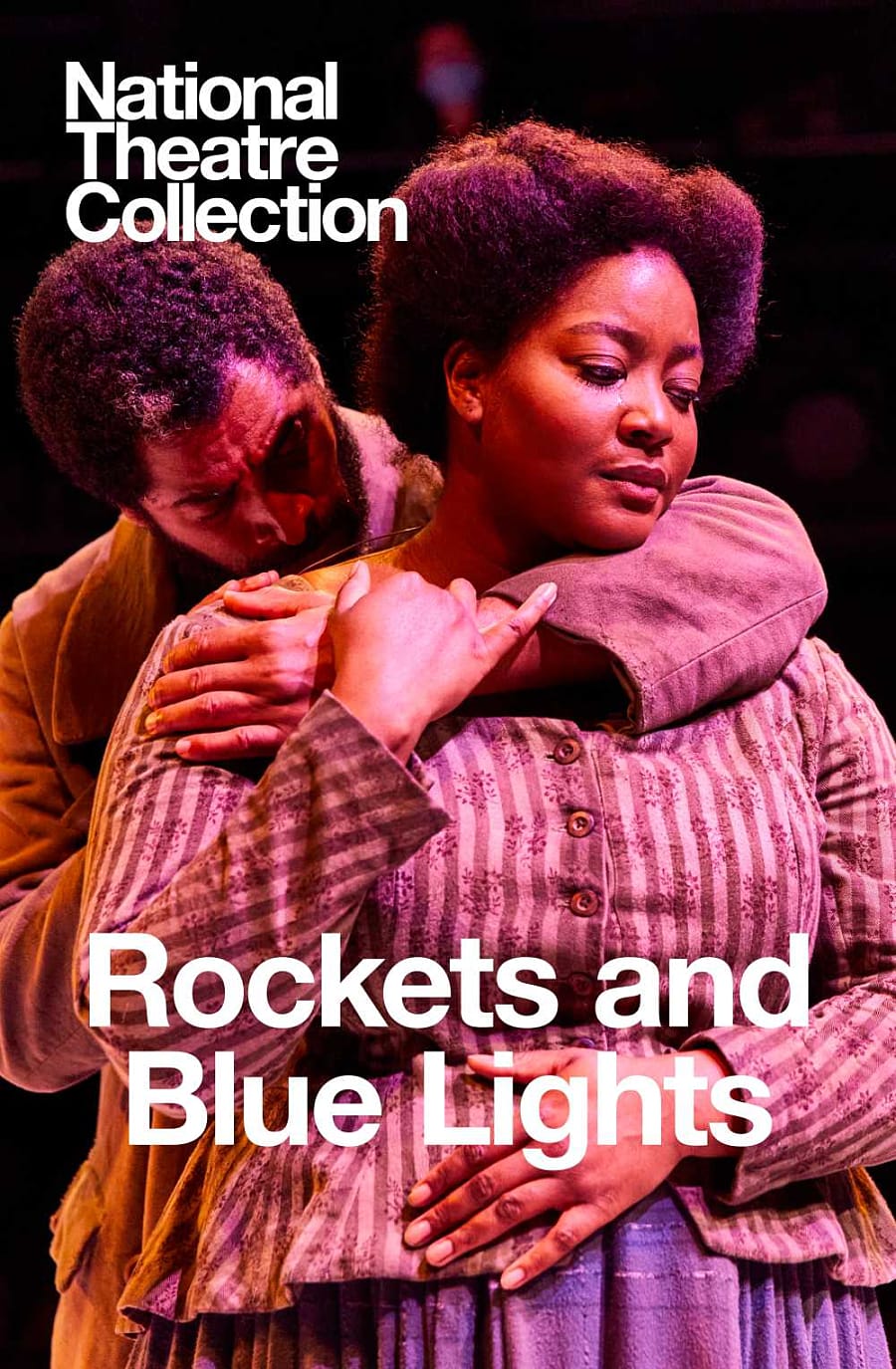 Two actors in close embrace where the actor is hugging the actress from the back. A production Rockets and Blue Lights, recorded for the National Theatre