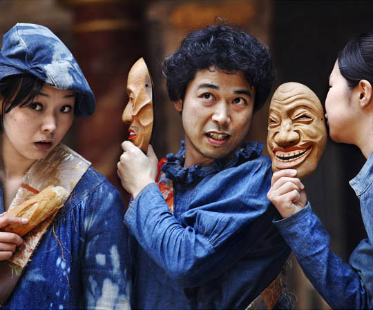 Three actors performing in the production Coriolanus in the language Japanese at Shakespeare’s Globe Theatre, London