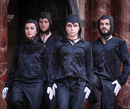 Four actors performing in the production Henry VI Part 2 in the language Albanian at Shakespeare's Globe Theatre, London