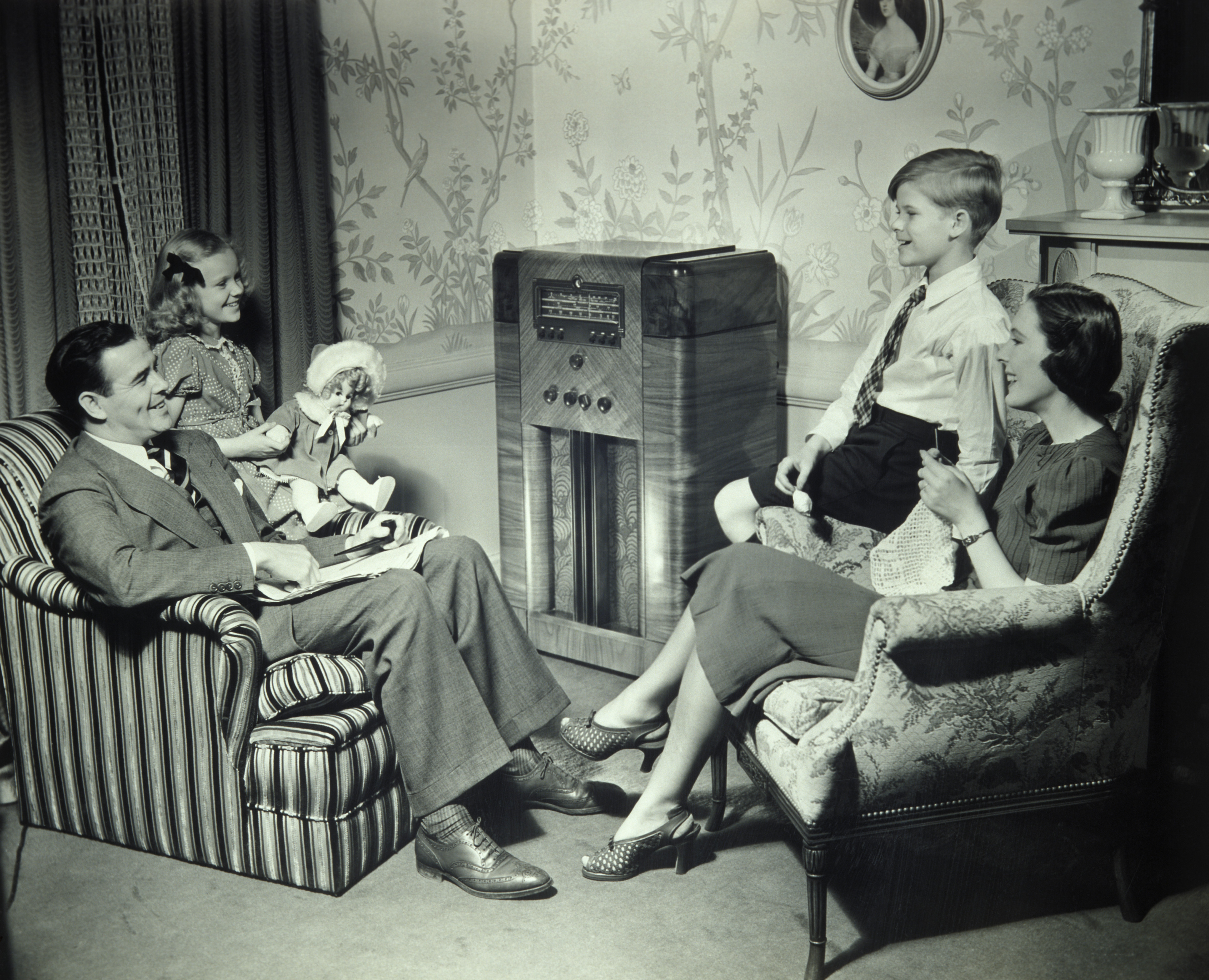 UNITED STATES - CIRCA 1950s: Family listening to radio (George Marks/Getty Images) 