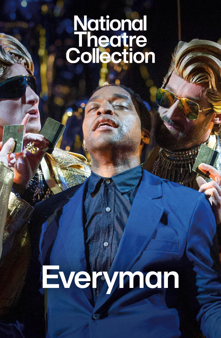 Chiwetel Ejiofor as Everyman in a navy blue suit leans back against a man in a gold suit with sunglasses on and gold coiffed hair