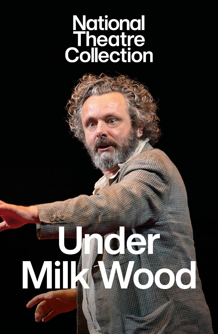 Michael Sheen as Dylan Thomas holds an arm out with a serious expression