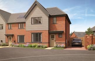 A modern brick and wood townhouse with a driveway and car sits in front of a clear blue sky with wispy clouds.