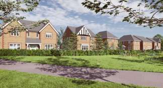 A residential neighborhood with well-maintained houses, lush greenery, and a paved walkway in the foreground.