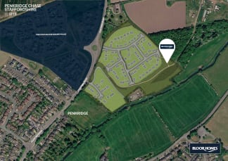 A new housing development is shown in the foreground, with existing residential areas and agricultural fields in the background.