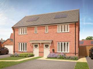 A pair of modern brick semi-detached houses with solar panels on the roof are fronted by a neat lawn and driveway, with a glimpse of a garage and another house in the background.