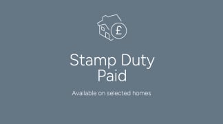 The image displays the text "Stamp Duty Paid" along with a house icon and a pound symbol, set against a dark gray background.