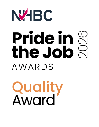 The foreground displays "NHBC Pride in the Job AWARDS Quality Award" in bold lettering, with "2026" vertically aligned on the right, against a plain white background.