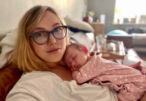 mother holding newborn baby
