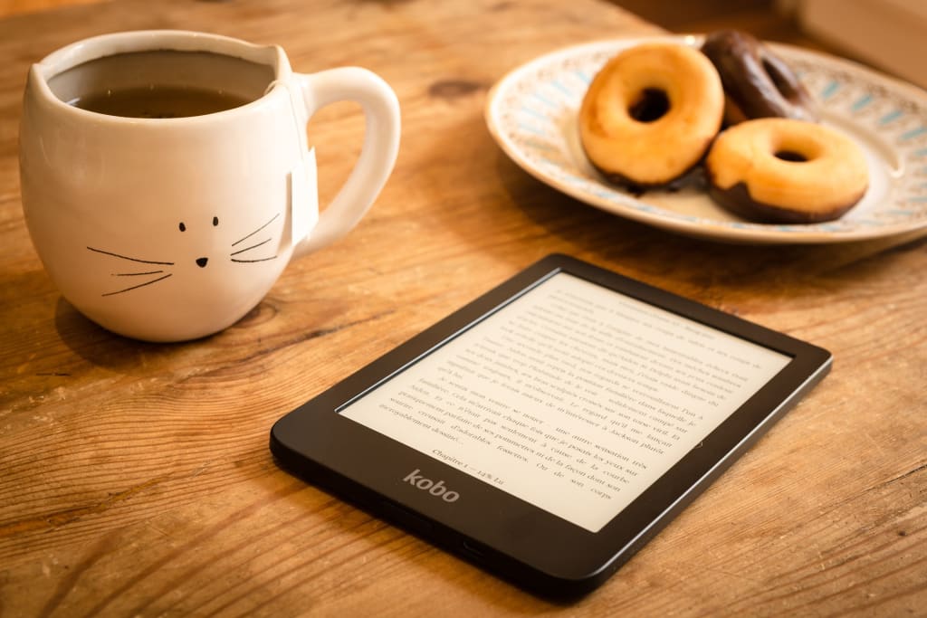 cute cat mug donuts kobo ereader researching Should I Hire an Editor for My First Book?