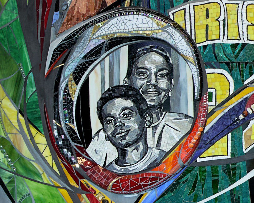 A portrait of LeBron James as a child, with his mom Gloria, made out of black and white tile