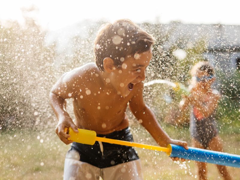 boy playing with water