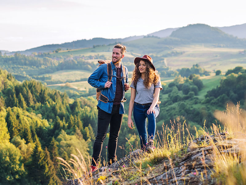 couple hiking in the hills