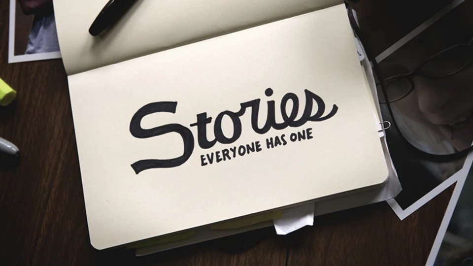 an open book with blank pages and caption saying everyone has a story an open book with blank pages and caption saying everyone has a story