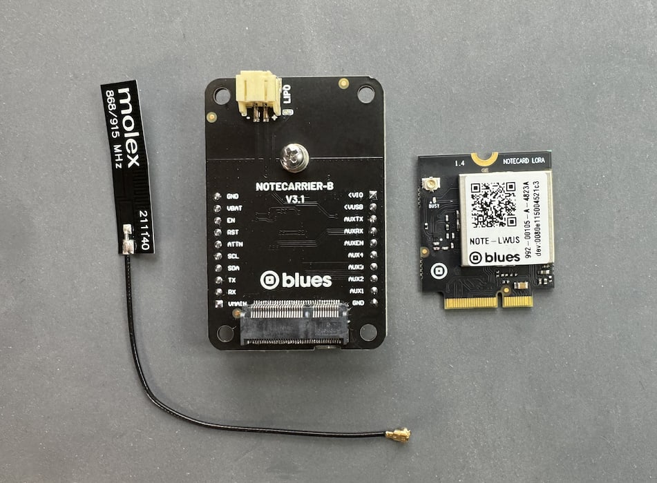 A Notecarrier B, Notecard for LoRa, and antenna on a table