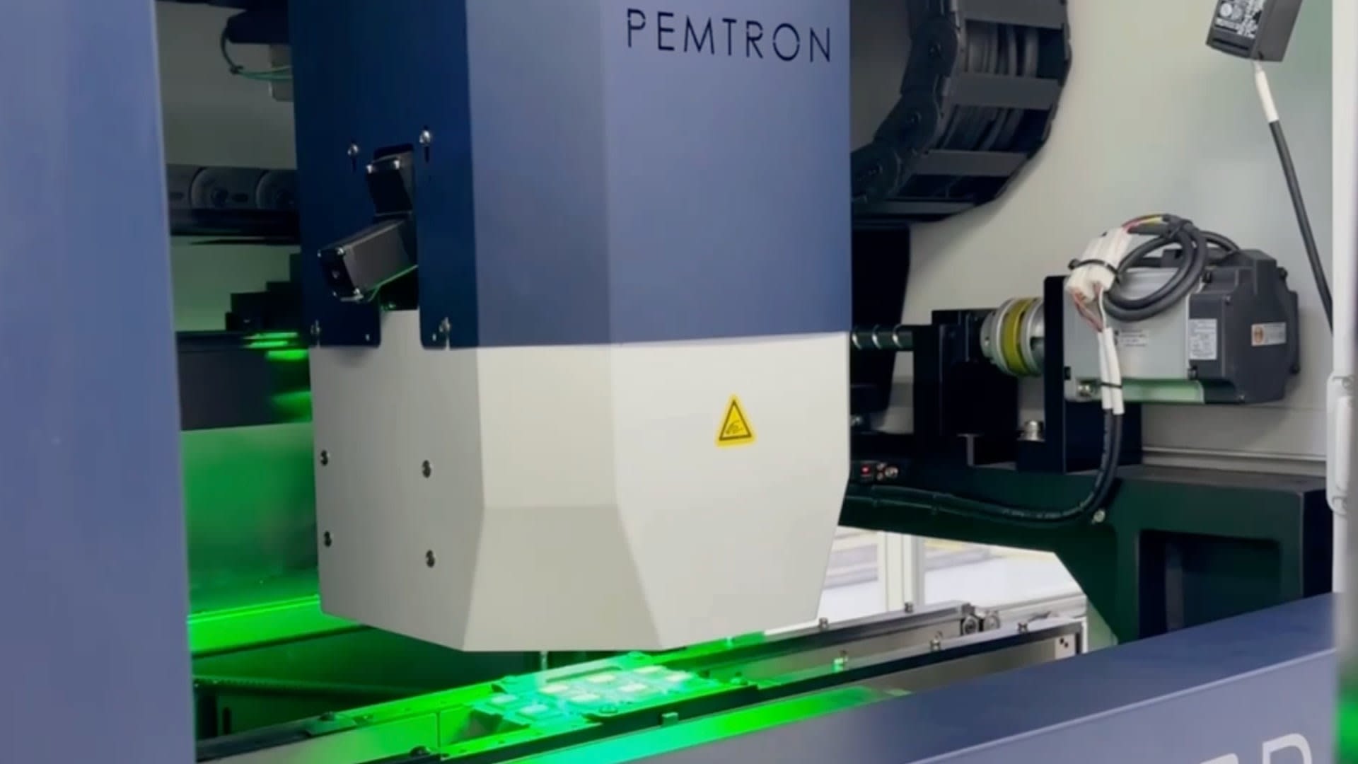 Automated Optical Inspection machine in action.