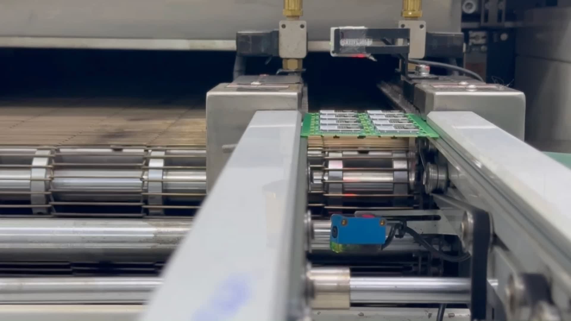 A panel of Notecards enters the reflow oven.