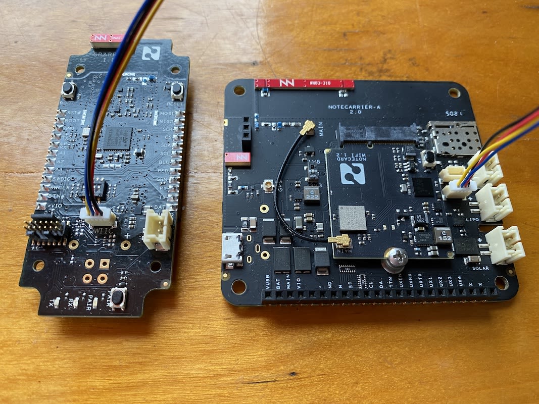 An Essentials Board connected to a Notecarrier with a Qwiic cable